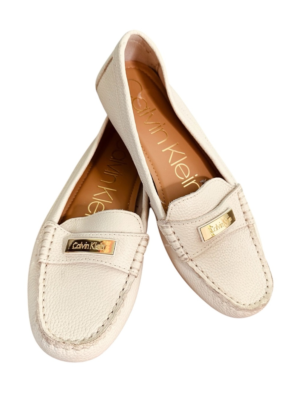 Calvin Klein Women's Ivory Pebbled Leather Loafers with Gold Plaque